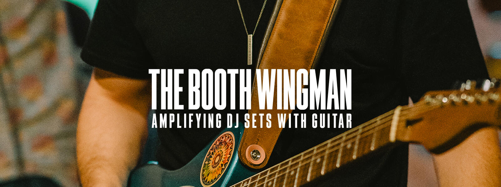 JJ Villafañe playing electric guitar during a live performance, a Houston-based guitarist known for improvisation with DJs